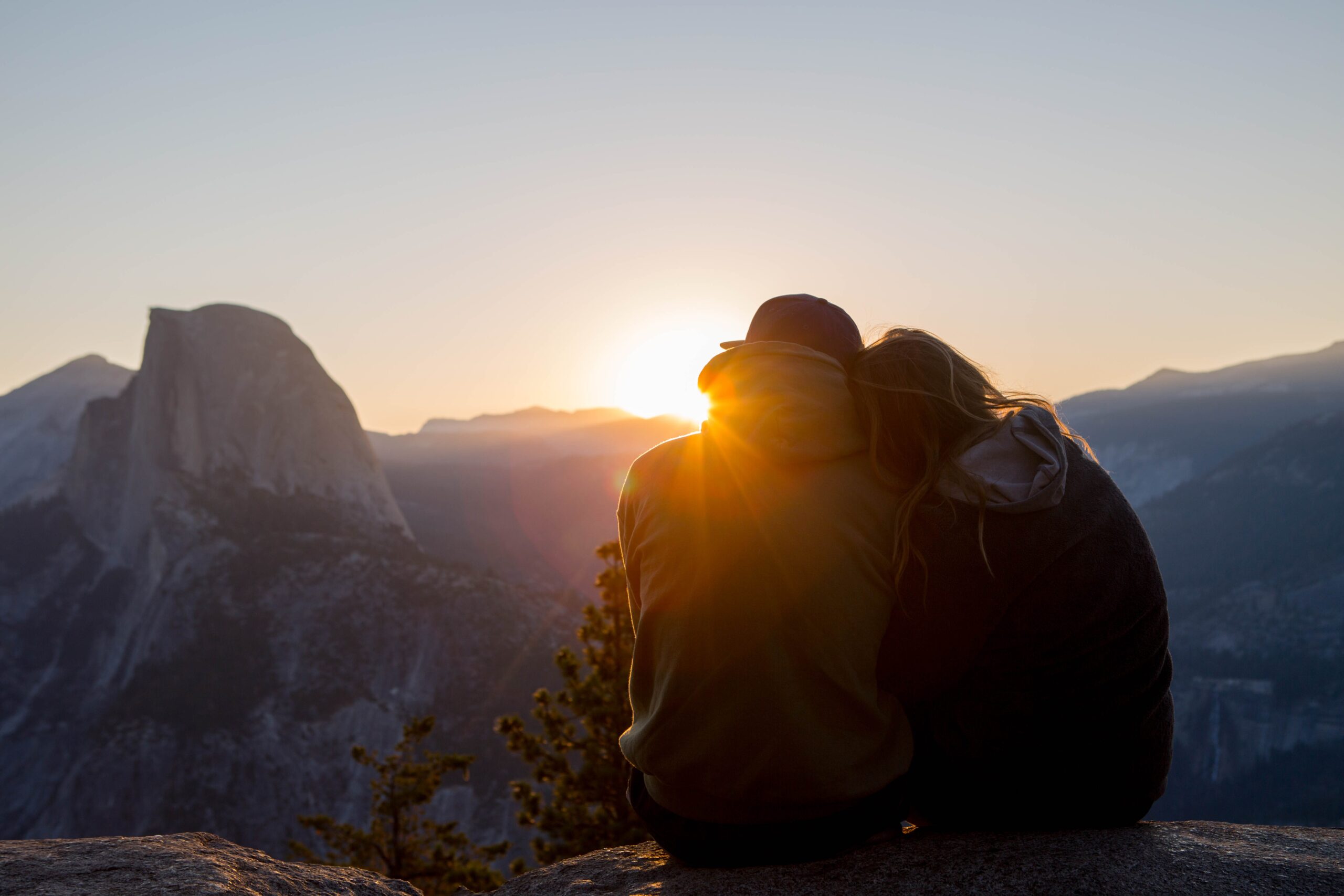 Couple on a date watching the sunset in Yosemite Valley