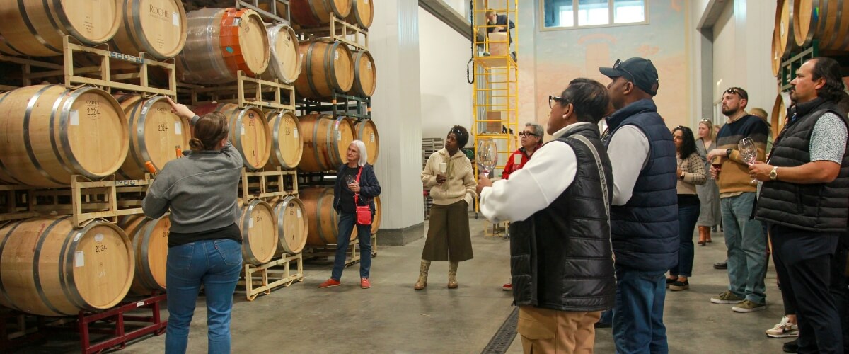 Wine Tour In The Barrel Room of a Napa Valley Winery